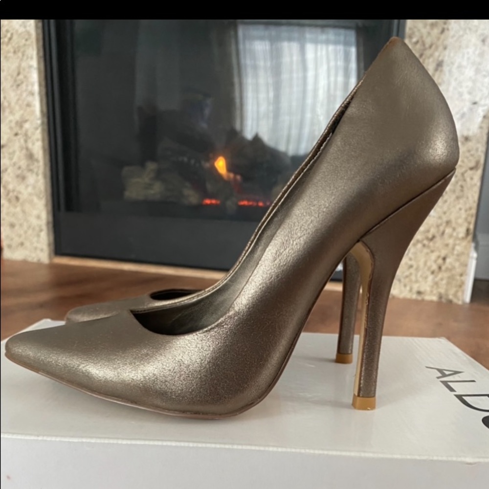 Champagne color, size 6 stiletto pumps from Aldo.